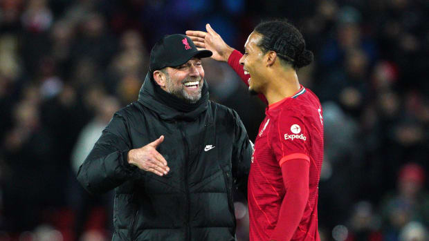 Jurgen Klopp (left) and Virgil van Dijk pictured congratulating each other following a 6-0 win over Leeds in February 2022